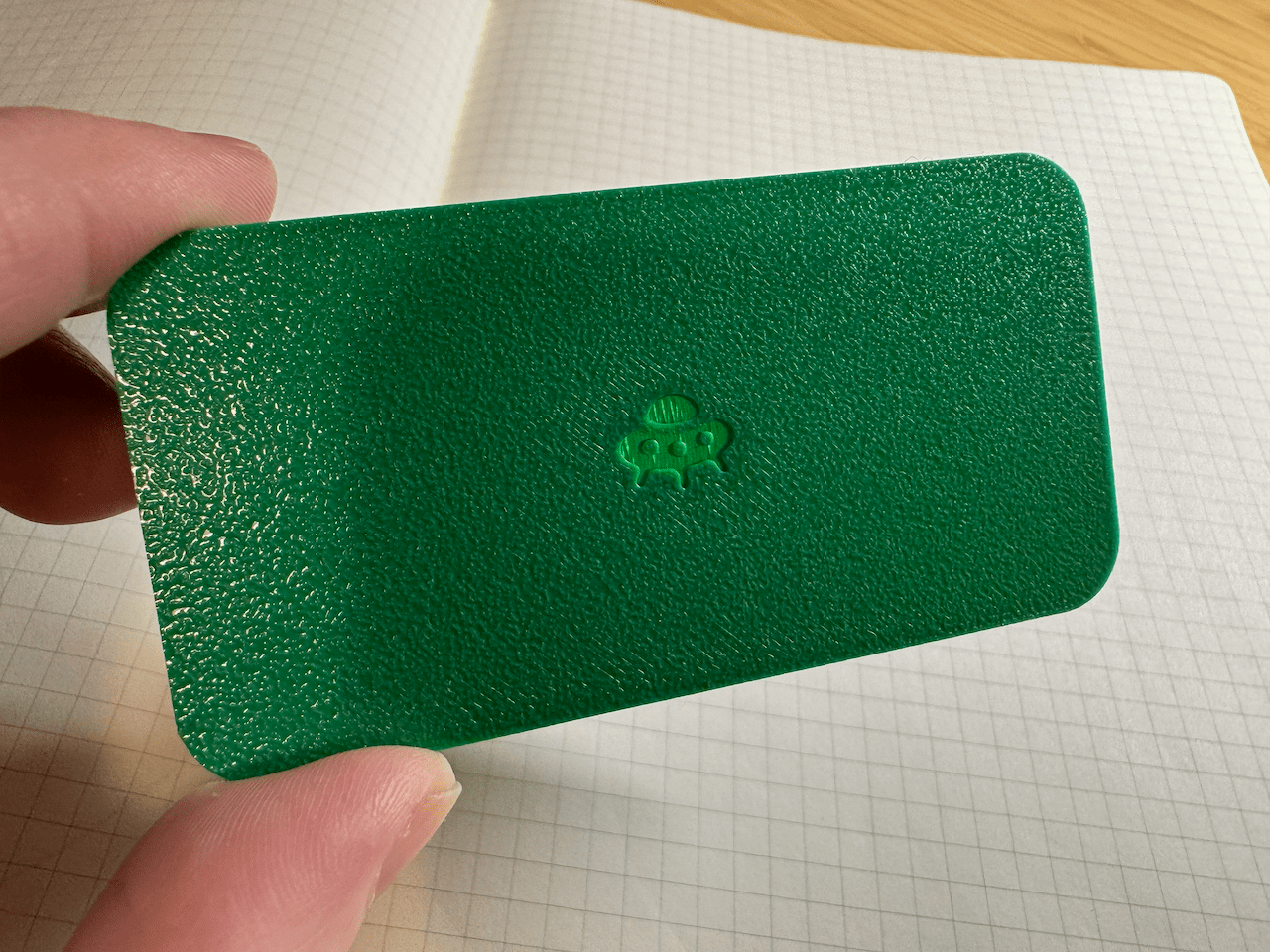 A UFO logo on the top of the case